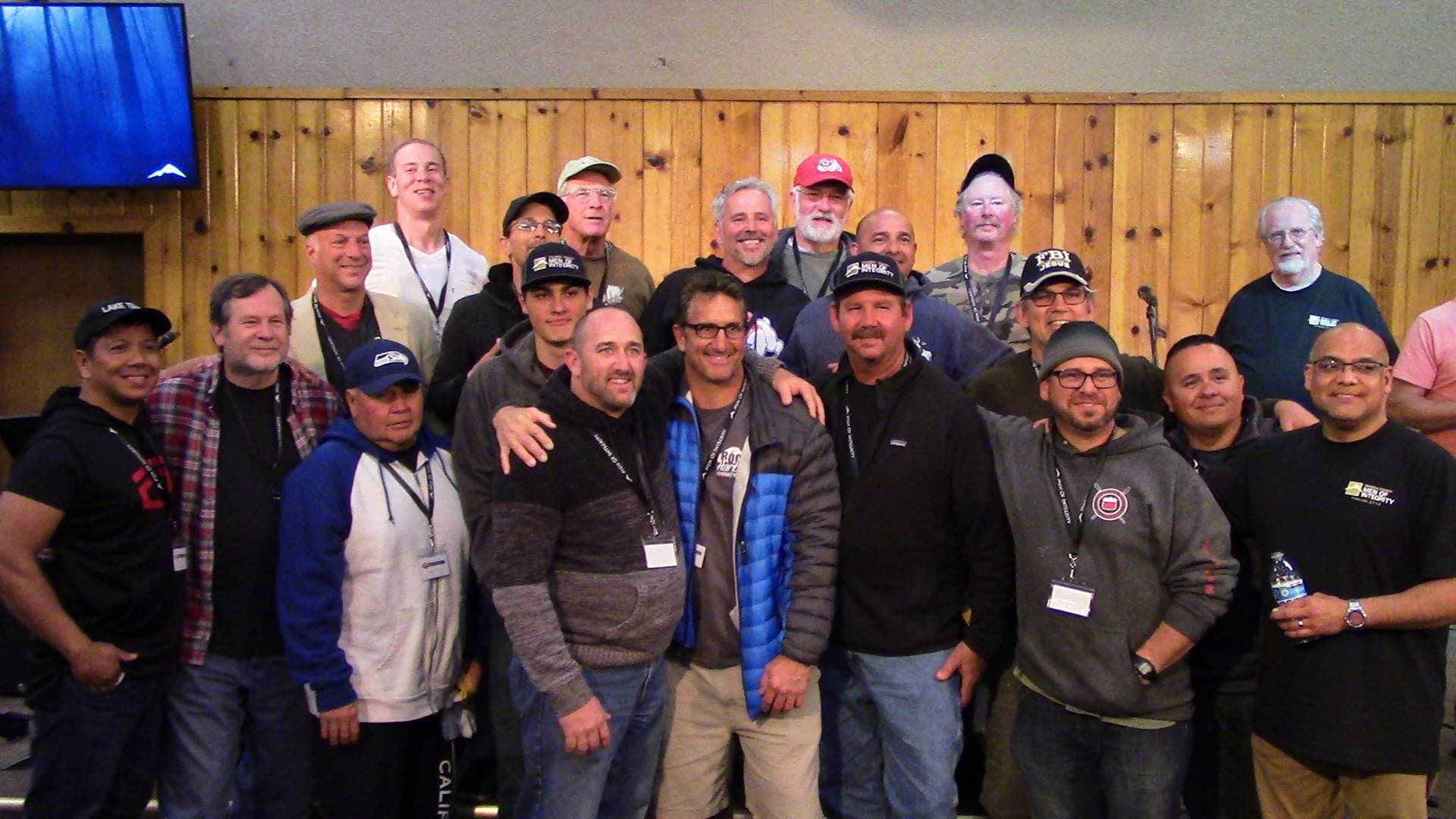Men gathered at Sugar Pine Christian Camp